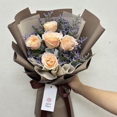 ช่อดอกกุหลาบสีส้ม "Sunset Charm"